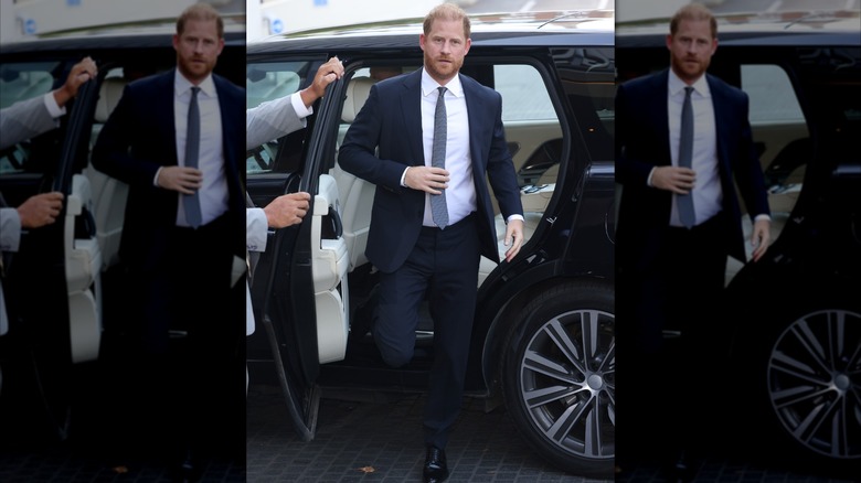 Prince Harry exiting a car