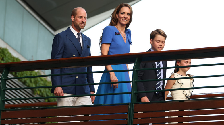Prince William walking with his family