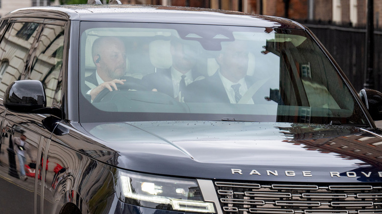 Prince Harry arriving at Clarence House in a Range Rover