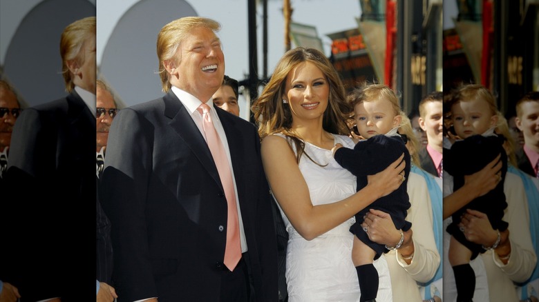 Donald Trump (L) , wife Melania (C) and son Barron attend the ceremony honoring him with a star on the Hollywood Walk of Fame on January 16, 2006 in Hollywood, California (2006)