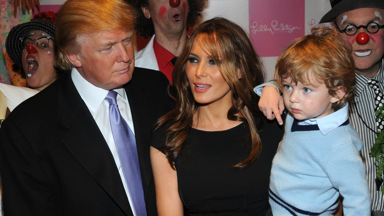 Donald Trump, Melania Trump and their son Barron attend the 17th Annual Bunny Hop at FAO Schwarz March 11, 2008 in New York City (2008)