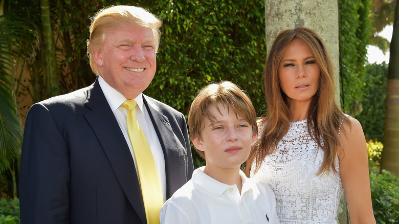 Donald Trump, Barron Trump and Melania Trump attends Trump Invitational Grand Prix Mar-a-Lago Club at The Mar-a-Largo Club on January 4, 2015 in Palm Beach, Florida (2015)