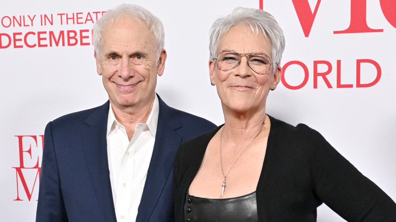 Christopher Guest and Jamie Lee Curtis smiling
