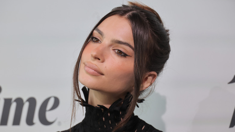 Emily Ratajkowski lips and black high-neck dress