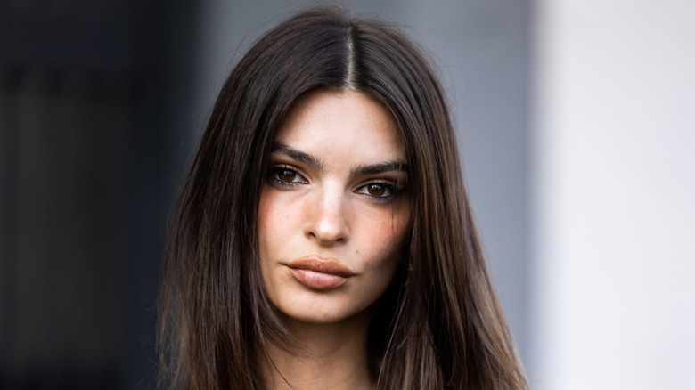 Emily Ratajkowski pouting in lipstick