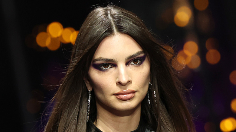 Emily Ratajkowski black smokey eyes wearing silver hoops