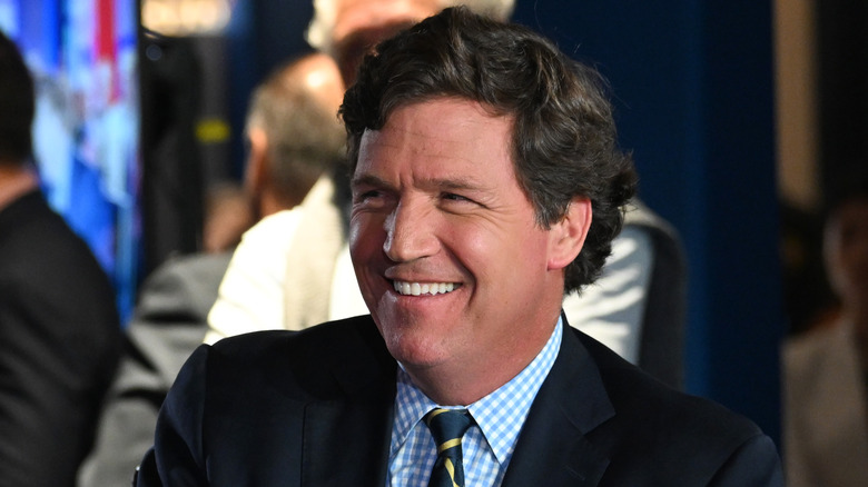 Close-up of Tucker Carlson smiling 