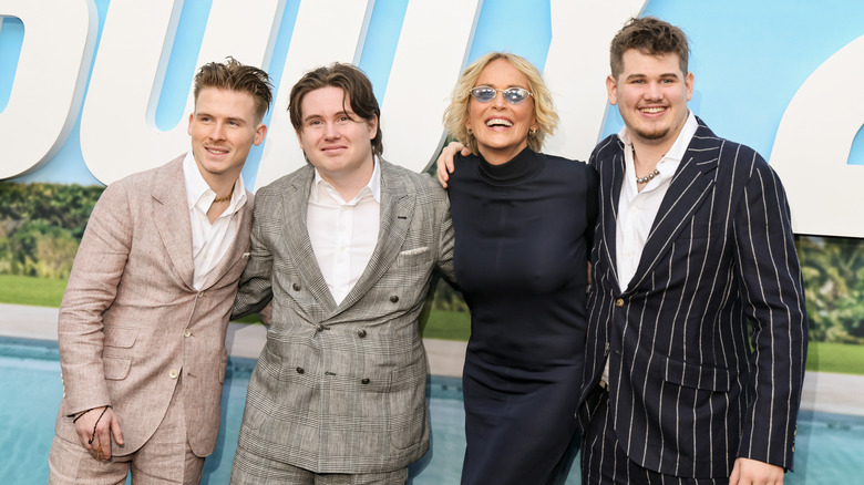 Sharon Stone posing with her children at a movie premiere in 2025