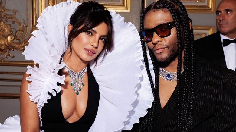 Law Roach with Priyanka Chopra in a black and white gown