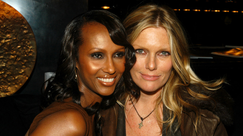 Iman and Patti Hansen during Donna Karan Celebrates the First Twenty Years with the Launch of "The Journey of a Woman: 20 Years of Donna Karan" at Donna Karan New York in New York City, New York, United States.
