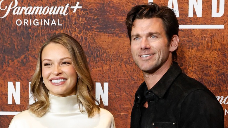 Kayla Wallace and Kevin McGarry smiling at the "Landman" premiere