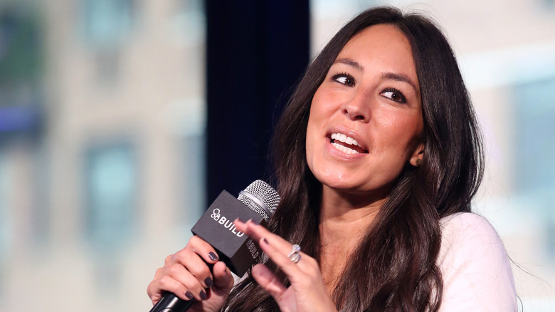 Joanna Gaines talking with microphone