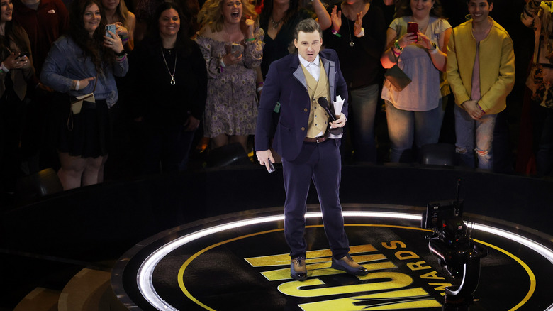 Morgan Wallen accepting an award at the 2022 ACM Awards