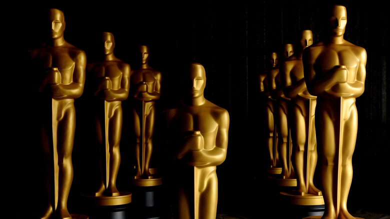 Oscar statues in three rows