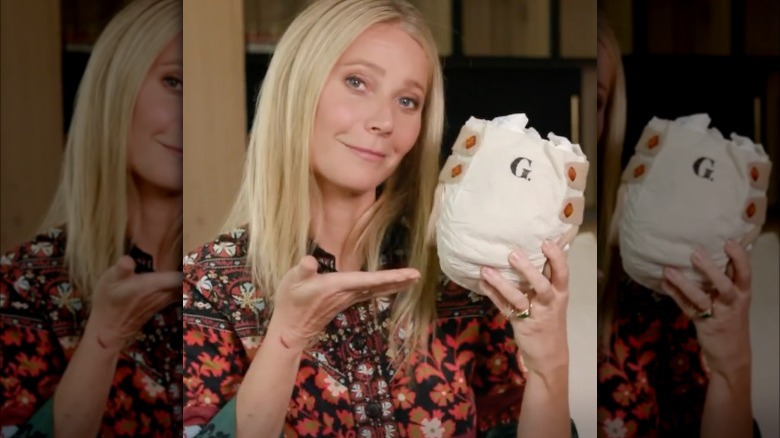 Gwyneth Paltrow holding Goop Diaper 