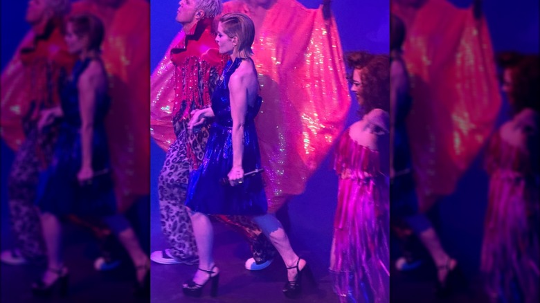 Kelly Osbourne walking onstage