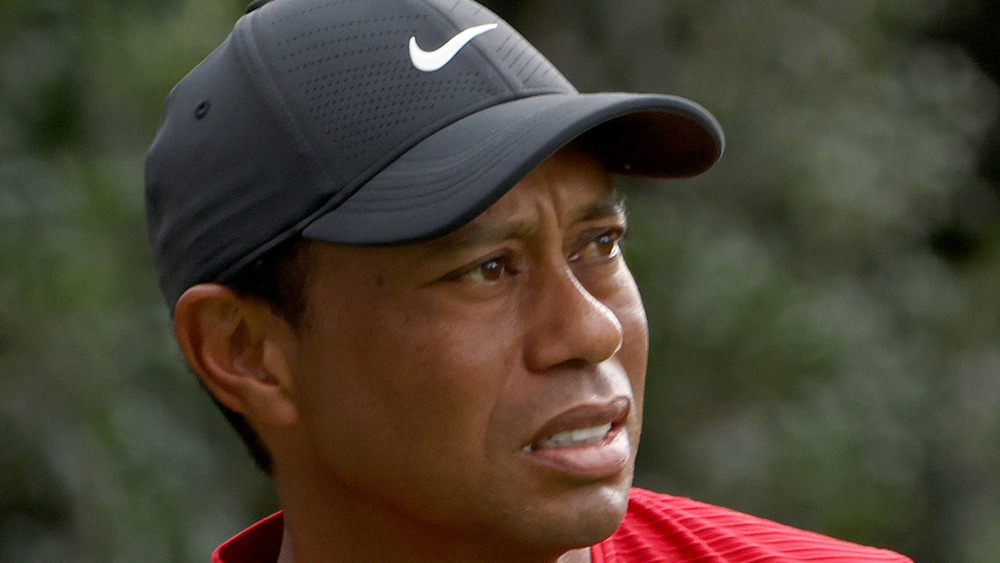 Tiger Woods wearing a Nike baseball cap