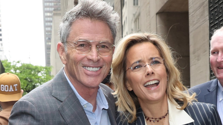 Téa Leoni and Tim Daly smiling while outdoors in Manhattan in 2026