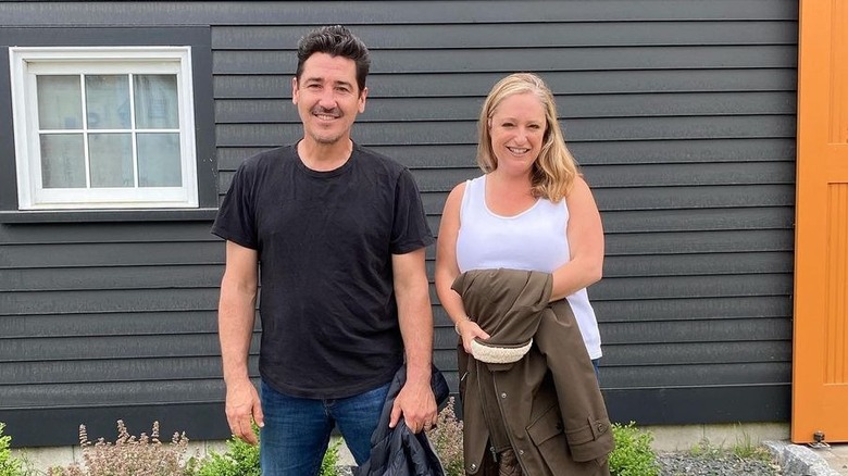 Jonathan Knight poses on the set of Farmhouse Fixer