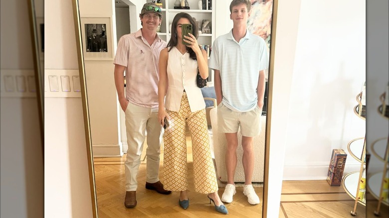 Kaitlan Collins standing in front of the mirror taking a selfie