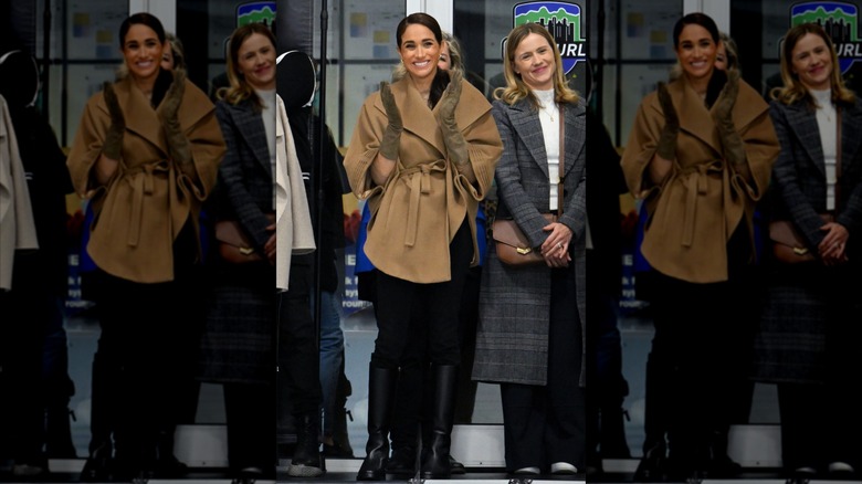 Meghan Markle wearing a tan wrap coat and beige gloves at the Invictus Games in 2024.