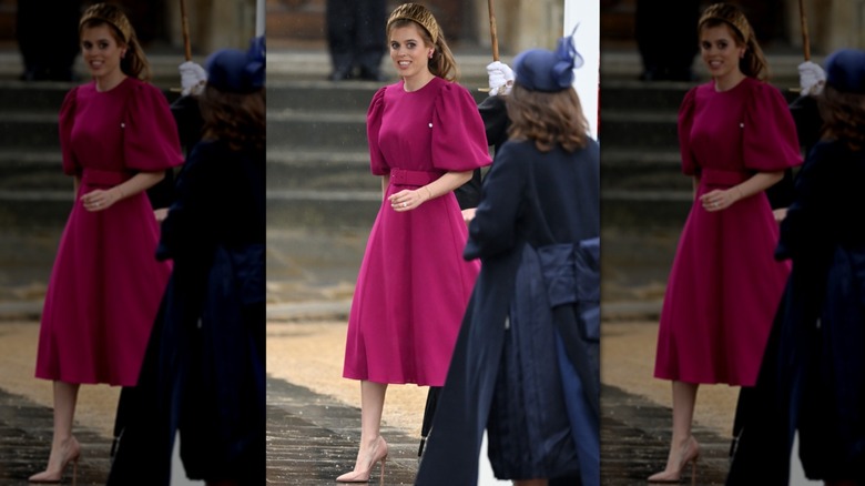 Princess Beatrice smiling in a pink dress and heels