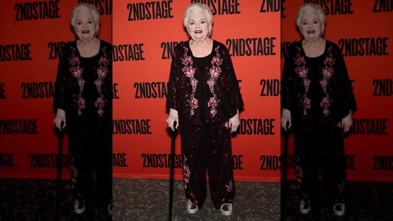 June Squibb wearing a sparkling blouse and pants with floral design at the Marjorie Prime premiere