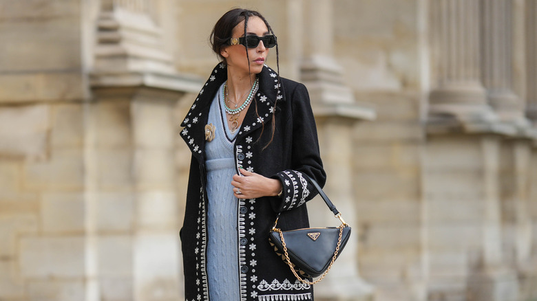 Stylish woman wearing Prada