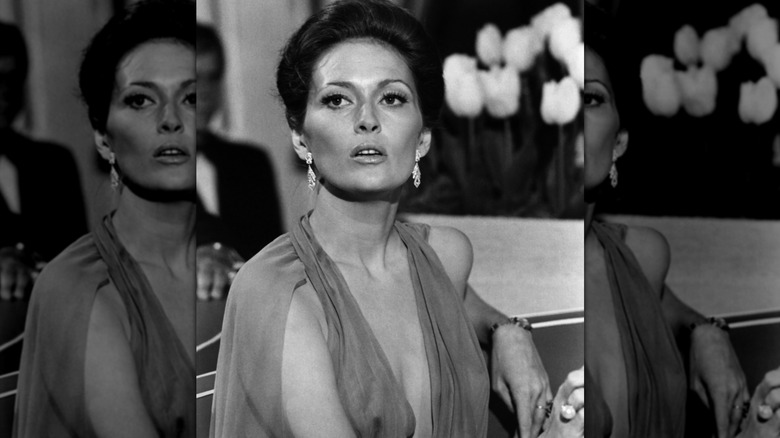 Faye Dunaway looking serious with her lips pursed