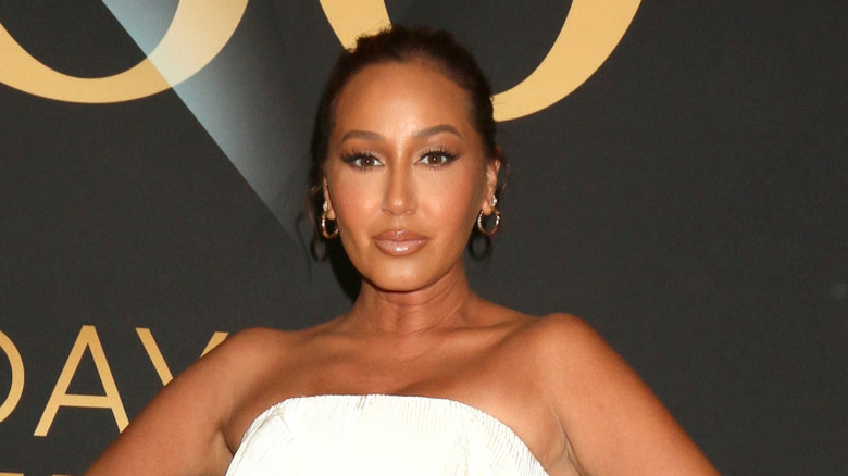 Adrienne Bailon-Houghton posing at the 50th Daytime Emmy Awards in 2023