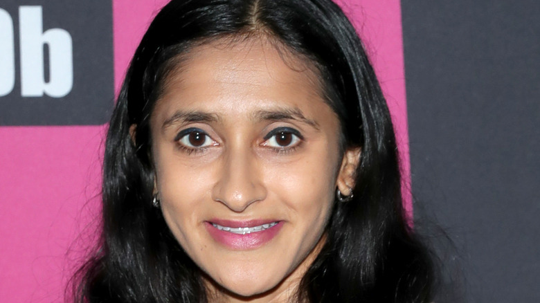 Aparna Nancherla posing for a picture at an event