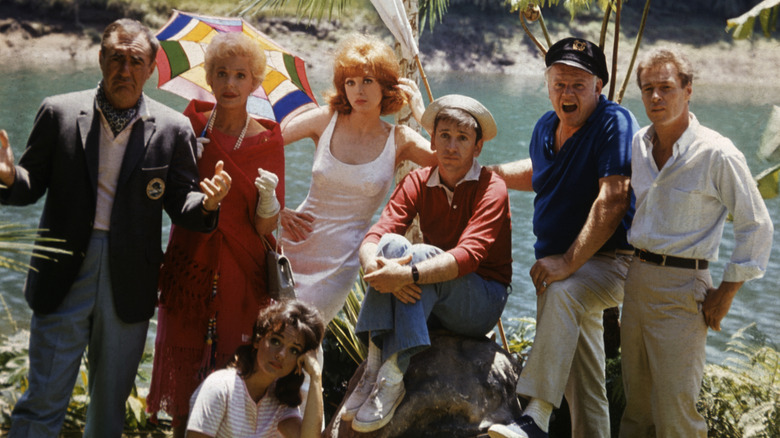 The cast of "Gilligan's Island" looking downcast on set