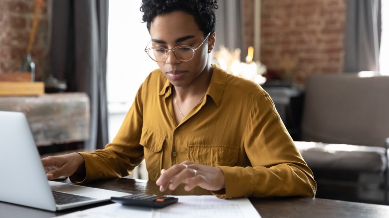 Woman working on her budget