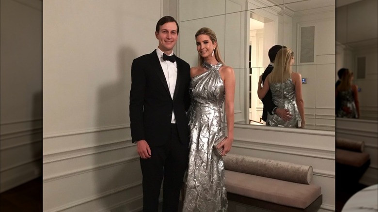 Jared Kushner and Ivanka Trump smiling in formalwear