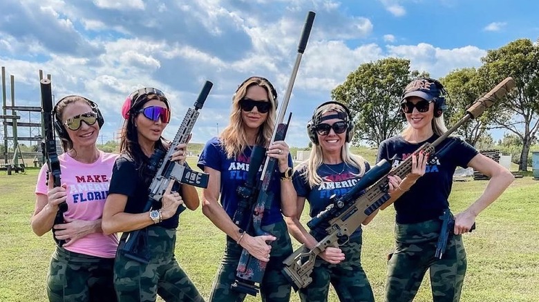 Lara Trump and her friends posing with guns