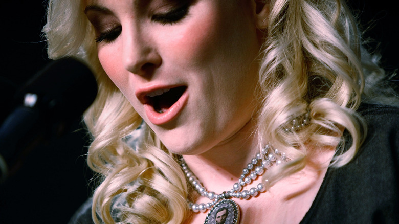 Meghan McCain talking onstage