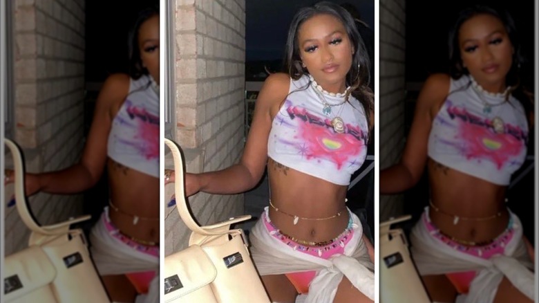 Possibly Sasha Obama posing outside