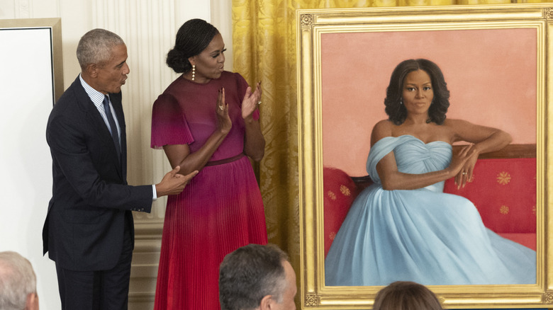 Barack and Michelle Obama checking out her portrait