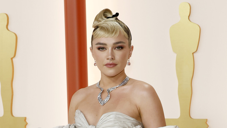 Florence Pugh looking to camera