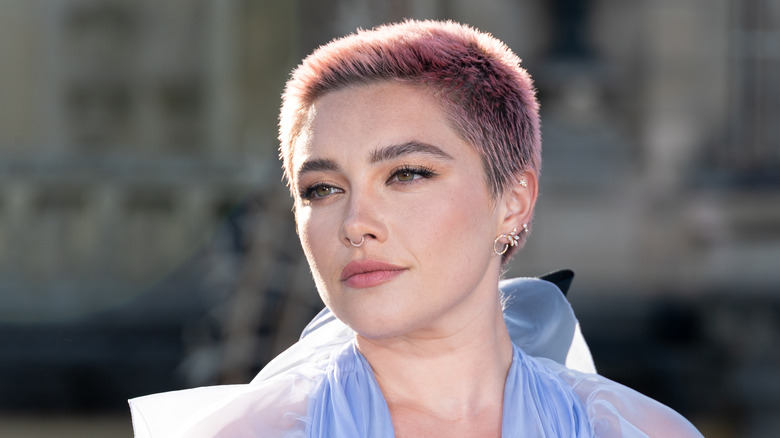 Florence Pugh looking to camera