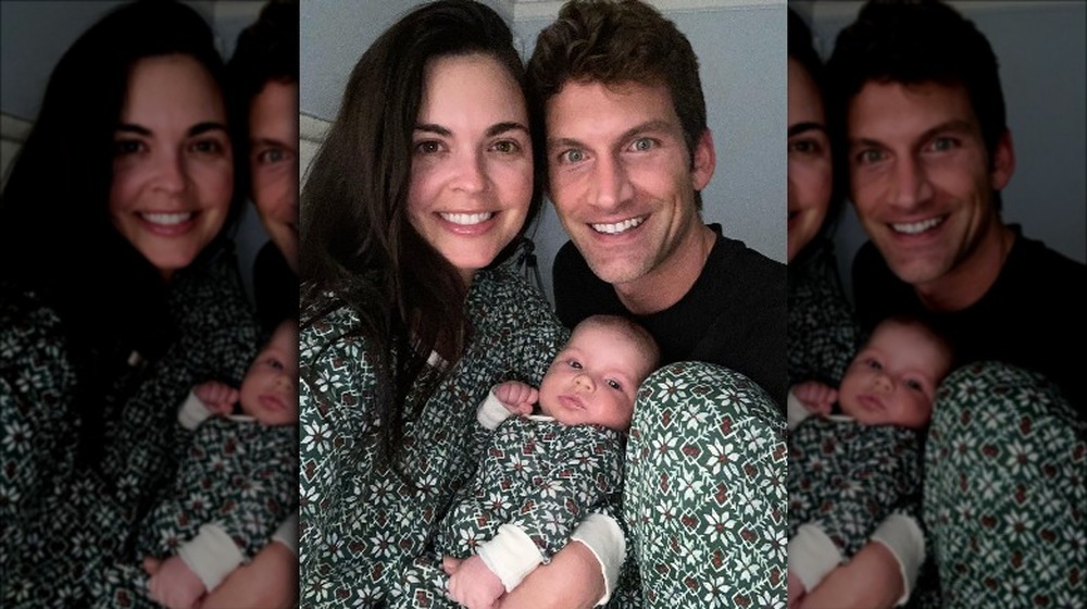 Katie Lee, Ryan Biegel and baby Iris cuddling