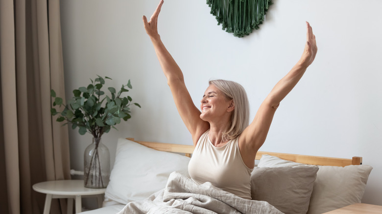 woman waking up in bed