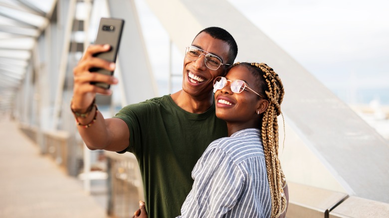 a couple taking a selfie