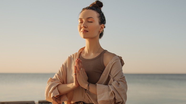 woman practicing yoga