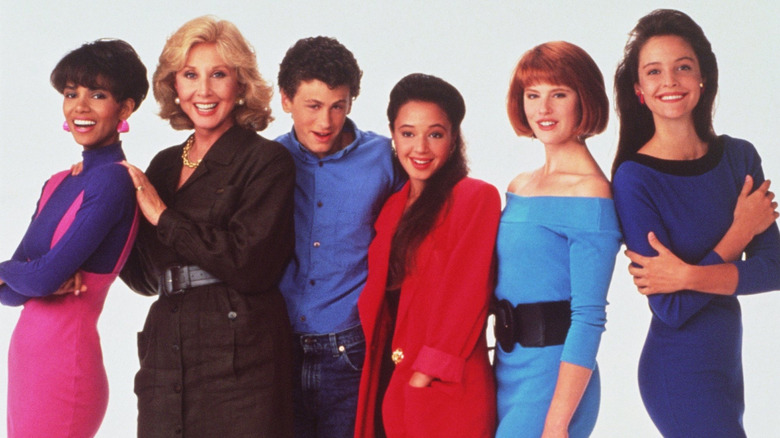 Cast promo of 'Living Dolls' featuring Halle Berry (far left, wearing purple and pink) and Leah Remini (middle, wearing red)
