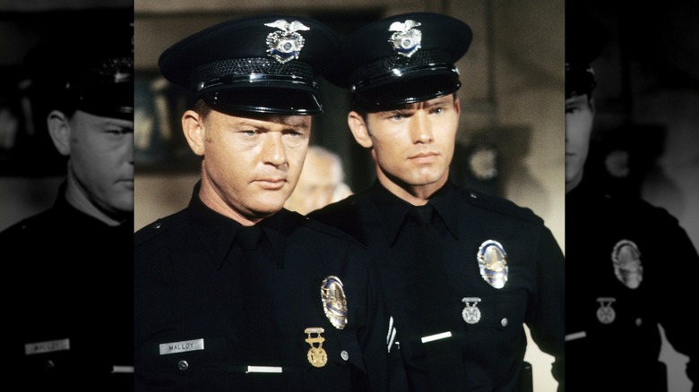 Pete Mallory and Kent McCord acting in police uniform for an episode of Adam-12