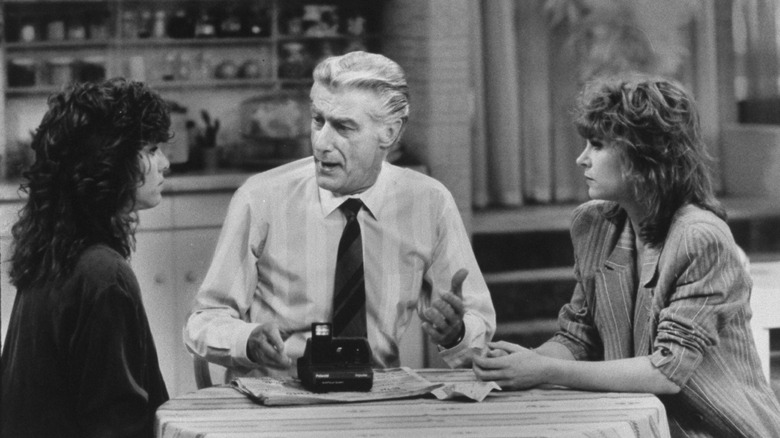 Empty Nest cast sitting around small table
