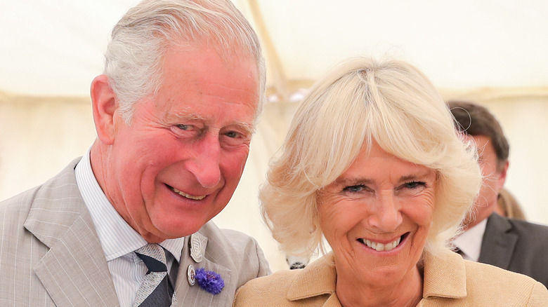 King Charles and Queen Consort Camilla smiling