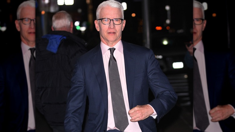 Anderson Cooper walking through Times Square