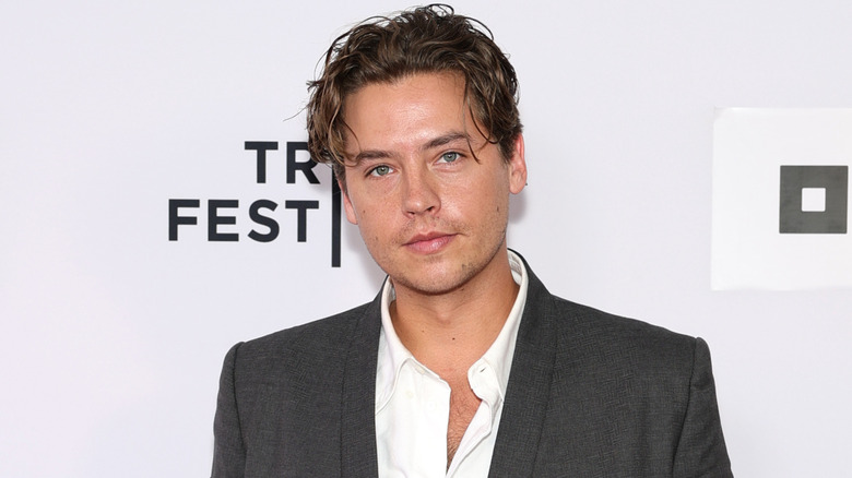 Cole Sprouse posing on red carpet